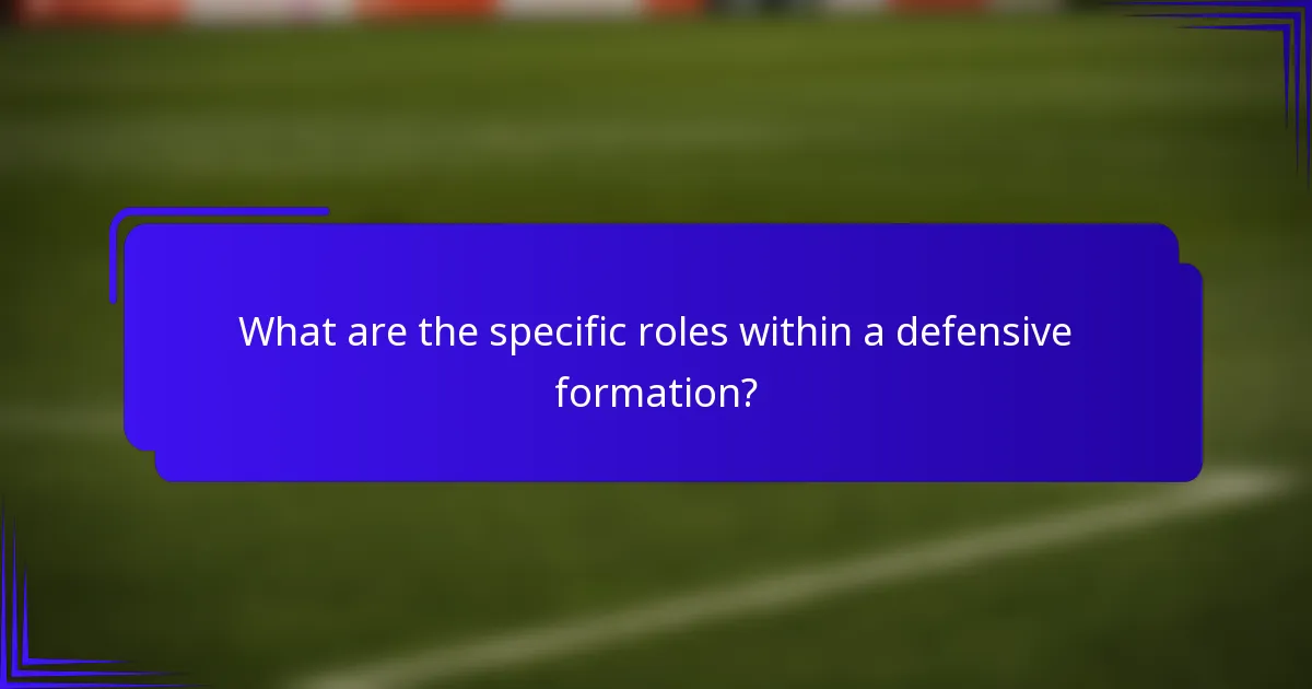 What are the specific roles within a defensive formation?