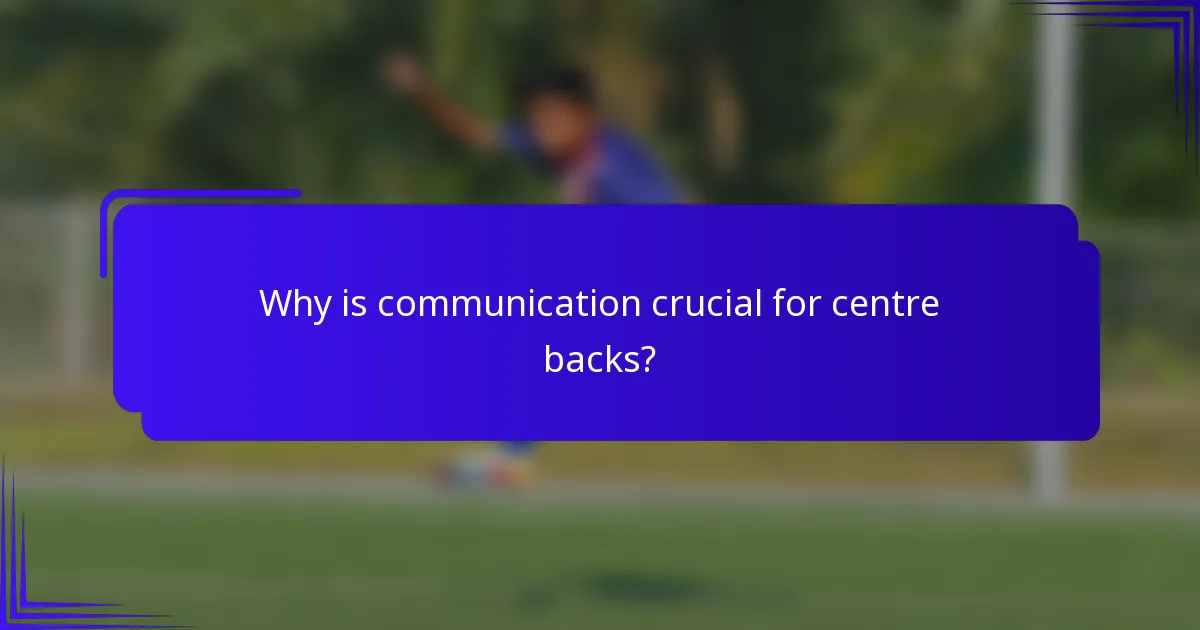 Why is communication crucial for centre backs?